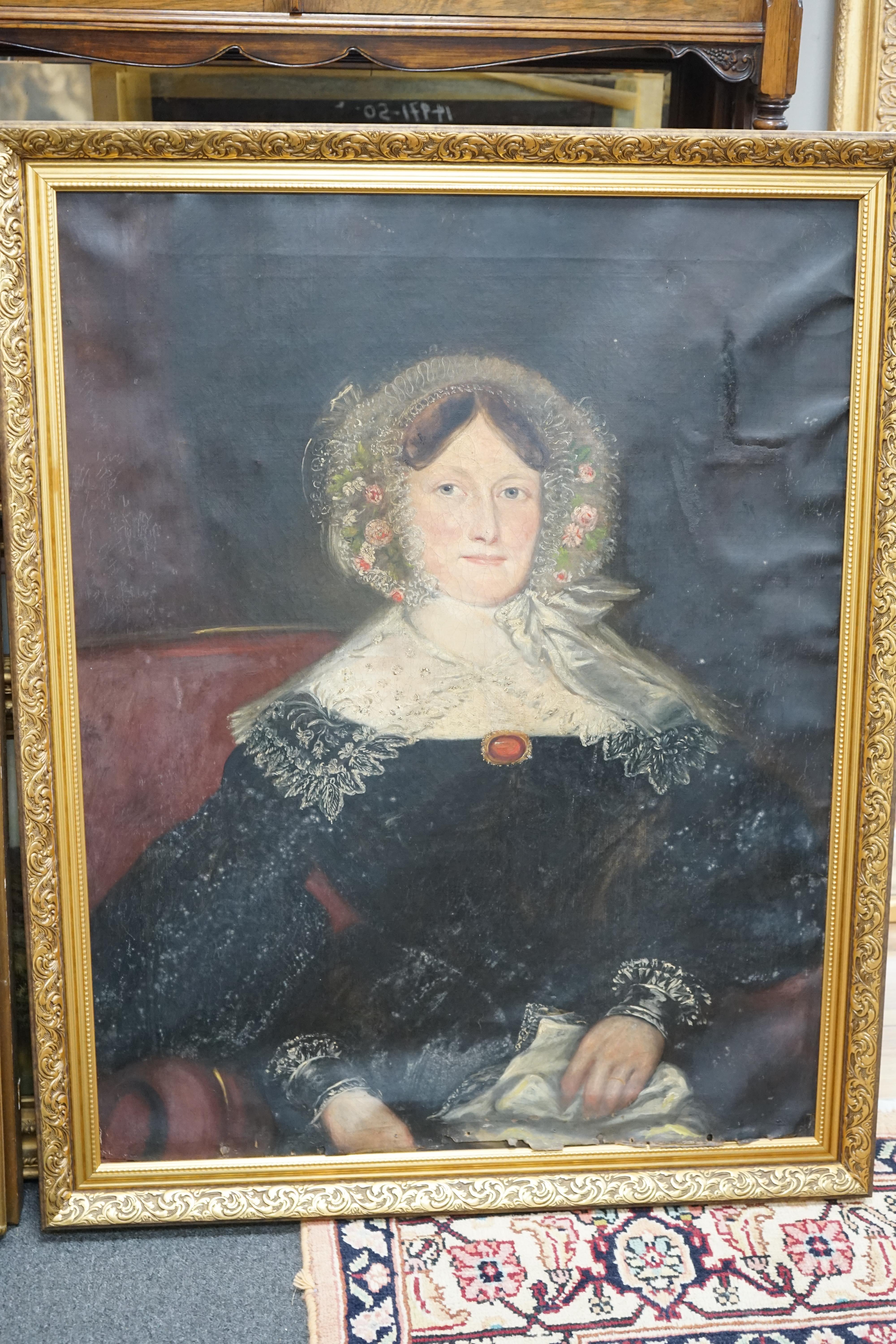 Two 19th century oils on canvas, comprising Regency naive School, portrait of a young lady and a mid 19th century School, portrait of a lady in mourning, largest 90 x 70cm. Condition - poor